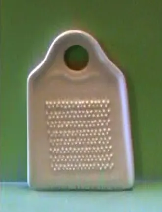 Grattugia in porcellana per lo zenzero con piccoli denti in rilievo