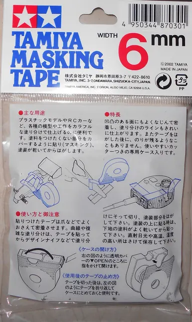 Verpackungsrückseite von Tamiya-Maskierband mit der Breitenangabe 6 mm und Anwendungsskizzen. Historische Produktaufnahme; den aktuellen Packungsinhalt im Angebot prüfen.